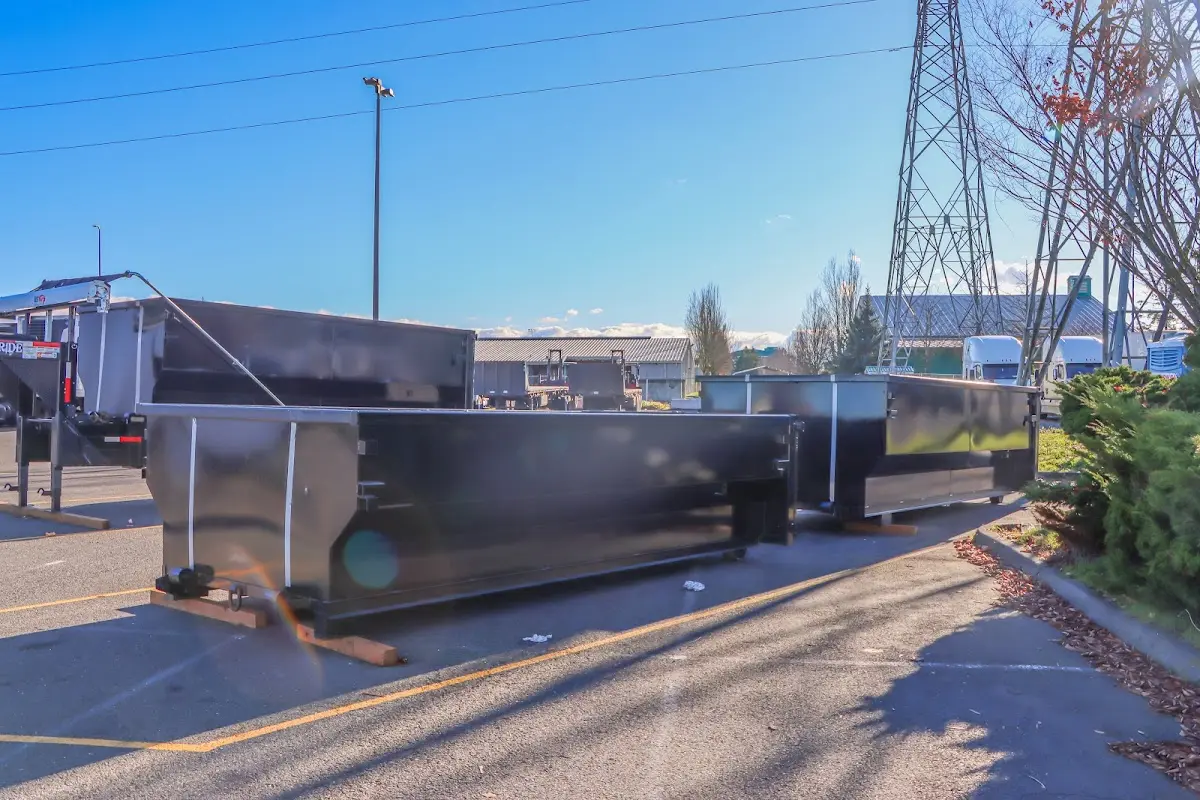 Roll-off dumpster ready for waste disposal at job site for 6 Yard Dumpster Rental in Leeds